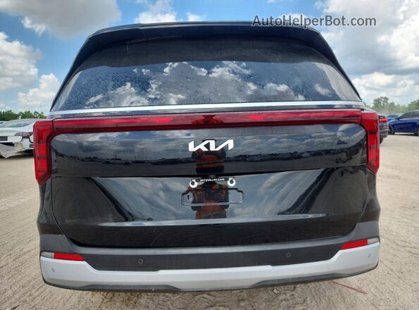 KNDNB5K38T6597629 2026 KIA CARNIVAL Black Widok z tyłu