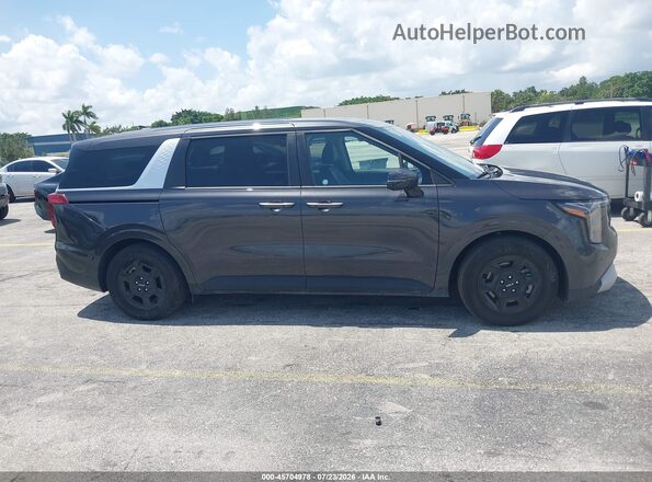 KNDNB5K3XS6529914 2025 KIA CARNIVAL MPV Gray Widok wnętrza z tyłu