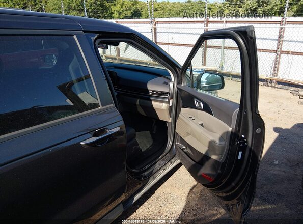 KNDNB5KA8T6118916 2026 KIA CARNIVAL MPV HYBRID Gray Вид салону спереду