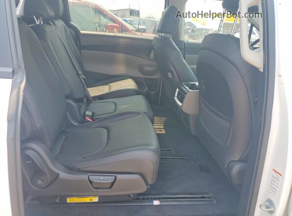 KNDNB5KA8T6123601 2026 KIA CARNIVAL Белый Вид задней части салона