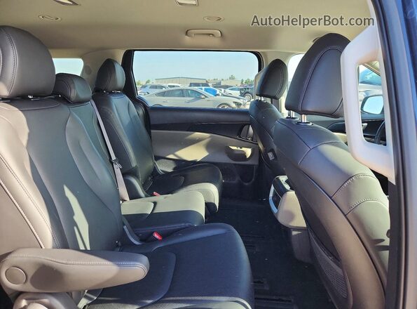 KNDNB5KA9T6128872 2026 KIA CARNIVAL Gray Widok wnętrza z tyłu