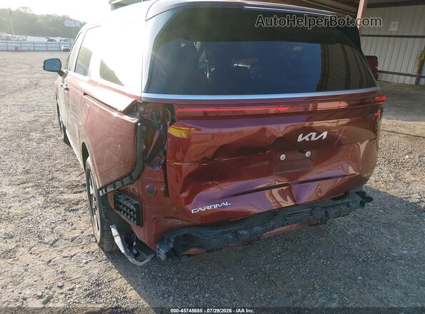 KNDNB5KAXT6110865 2026 KIA CARNIVAL MPV HYBRID Бордовый Вид спереди