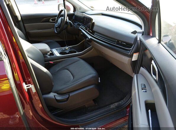 KNDNB5KAXT6110865 2026 KIA CARNIVAL MPV HYBRID Бордовый Вид салона спереди