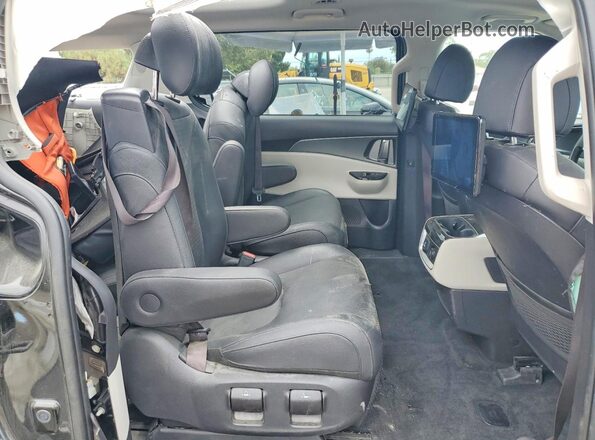 KNDNE5H33P6299199 2023 KIA CARNIVAL Black Vista interior trasera