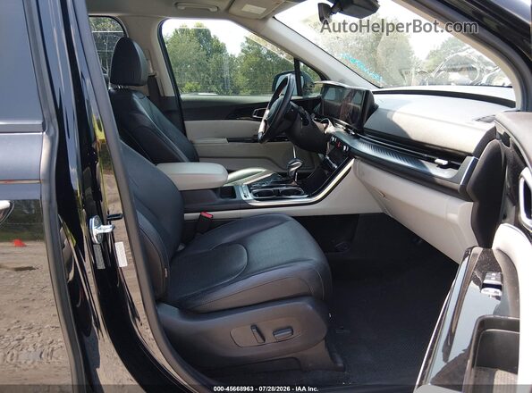 KNDNE5H38N6060938 2022 KIA CARNIVAL MPV Black Widok wnętrza z przodu