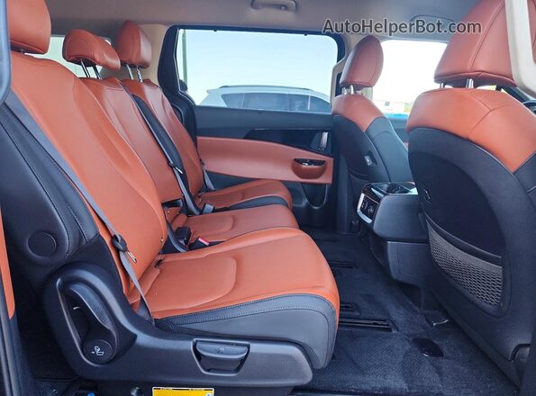 KNDNE5H38P6285993 2023 KIA CARNIVAL Teal Вид задньої частини салону