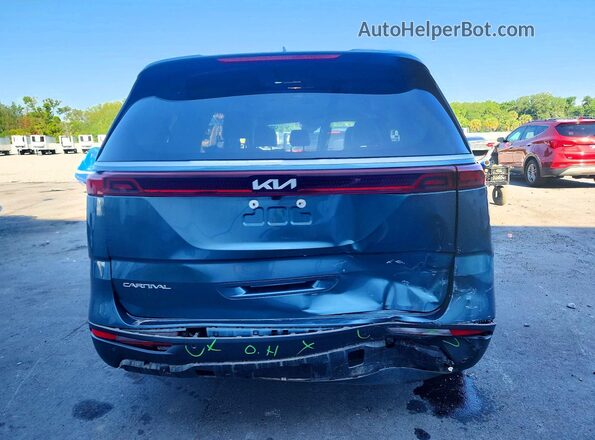 KNDNE5H38P6285993 2023 KIA CARNIVAL Teal Вид ззаду