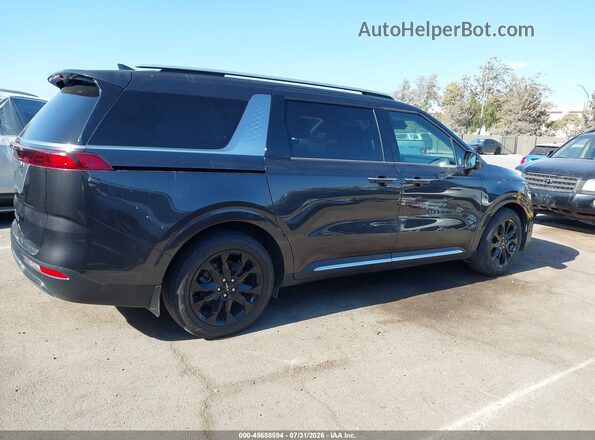 KNDNE5H39R6419588 2024 KIA CARNIVAL MPV Black Rear interior view