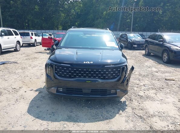 KNDNE5K34S6458104 2025 KIA CARNIVAL MPV Black Սալոնի հետևի տեսք