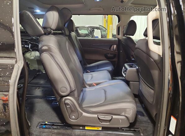 KNDNE5K37T6632345 2026 KIA CARNIVAL Черный Вид задней части салона