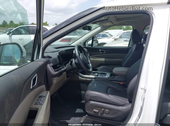 KNDNE5KA0S6064596 2025 KIA CARNIVAL MPV HYBRID White Widok wnętrza z przodu