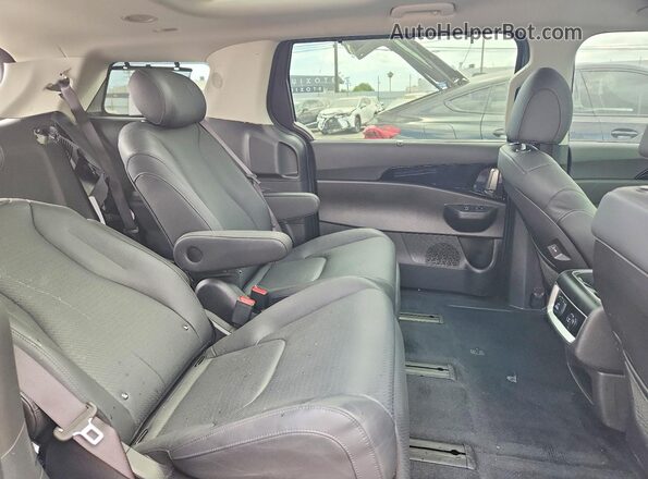 KNDNE5KA1T6087399 2026 KIA CARNIVAL Blue Вид задньої частини салону