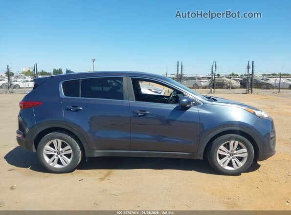 KNDPM3AC0J7329352 2018 KIA SPORTAGE Blue Սալոնի հետևի տեսք