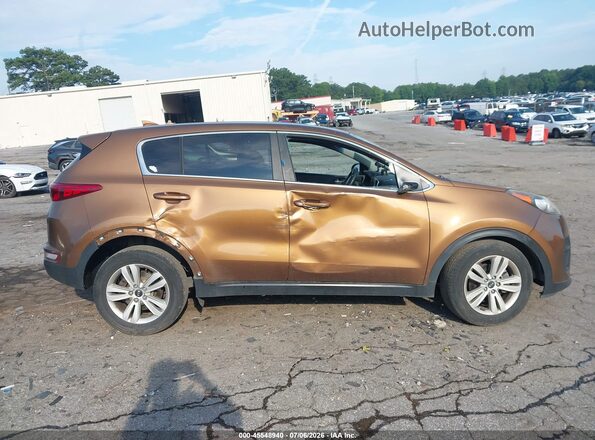 KNDPM3AC3H7211063 2017 KIA SPORTAGE Brown Rear interior view