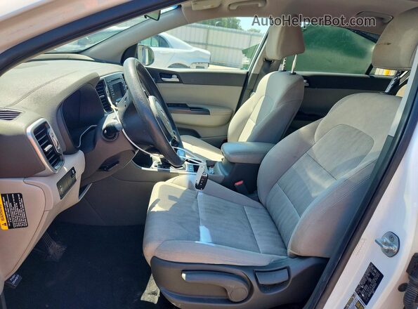 KNDPM3AC4H7047175 2017 KIA SPORTAGE White Widok wnętrza z przodu