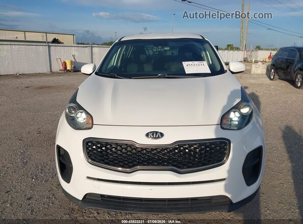 KNDPM3AC7K7615457 2019 KIA SPORTAGE White Vista interior trasera