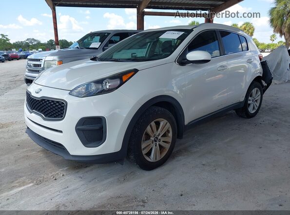 KNDPM3AC7K7625972 2019 KIA SPORTAGE White წინა მარცხენა ხედი სამი მეოთხედიდან