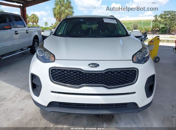 KNDPM3AC7K7625972 2019 KIA SPORTAGE White ხელსაწყოთა პანელის ხედი