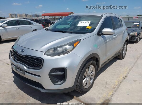 KNDPM3AC8J7329731 2018 KIA SPORTAGE Silver Vista tres cuartos delantera izquierda