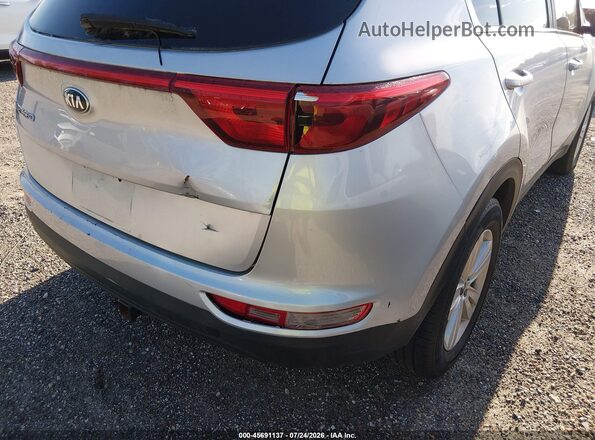 KNDPM3ACXK7580638 2019 KIA SPORTAGE Серебряный Вид спереди