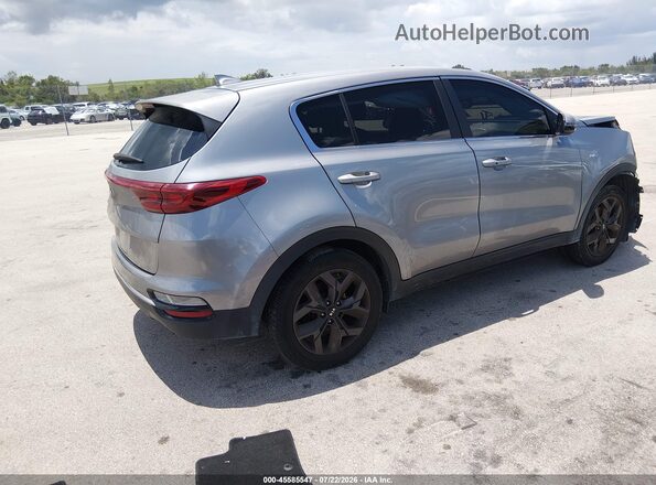 KNDPMCAC0N7956087 2022 KIA SPORTAGE Silver Trasero derecho