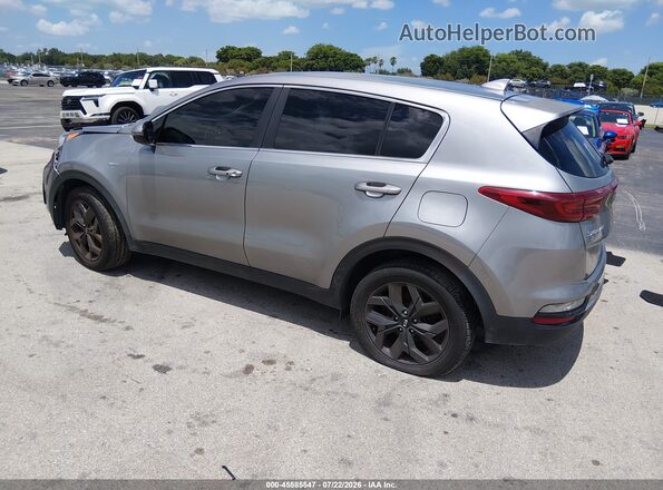 KNDPMCAC0N7956087 2022 KIA SPORTAGE Silver Trasero izquierdo