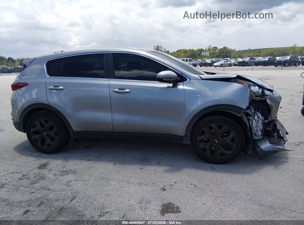 KNDPMCAC0N7956087 2022 KIA SPORTAGE Silver Vista interior trasera
