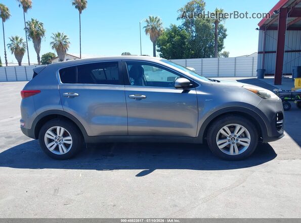 KNDPMCAC4J7451356 2018 KIA SPORTAGE Gray უკანა სალონის ხედი