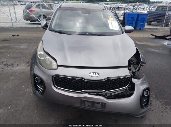 KNDPMCAC6H7264386 2017 KIA SPORTAGE Gray Սալոնի հետևի տեսք