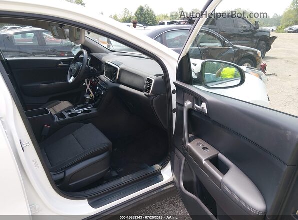 KNDPMCAC6M7913534 2021 KIA SPORTAGE Белый Вид салона спереди