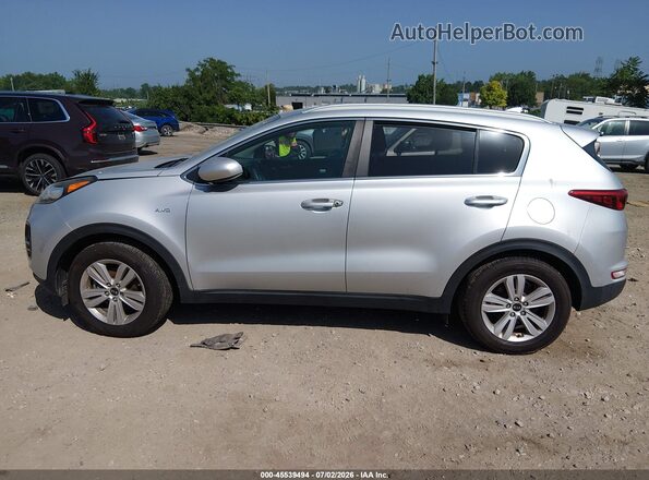 KNDPMCAC8K7501354 2019 KIA SPORTAGE Silver Вид задньої частини салону