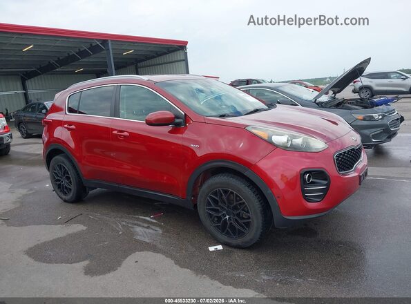 KNDPMCACXH7151881 2017 KIA SPORTAGE Red Widok wnętrza z tyłu