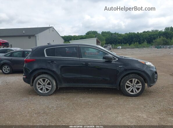 KNDPMCACXH7172990 2017 KIA SPORTAGE Black Widok wnętrza z tyłu