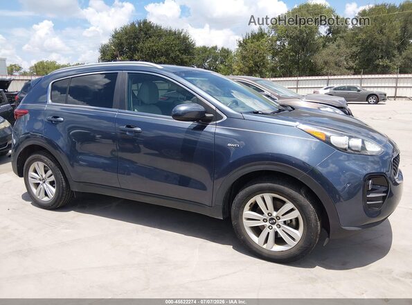KNDPMCACXH7288979 2017 KIA SPORTAGE Gray Widok wnętrza z tyłu