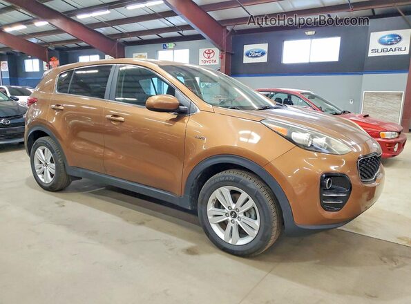 KNDPMCACXK7566593 2019 KIA SPORTAGE Коричневый Передняя правая четверть