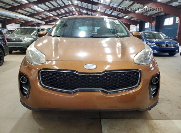 KNDPMCACXK7566593 2019 KIA SPORTAGE Коричневый Вид спереди