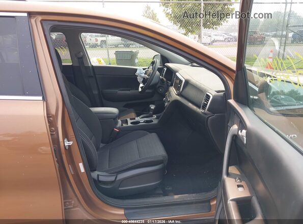 KNDPMCACXM7847585 2021 KIA SPORTAGE Коричневый Вид салона спереди