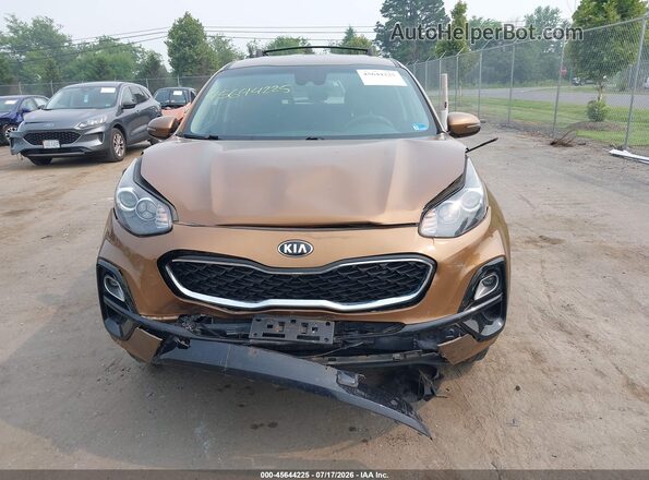 KNDPMCACXM7847585 2021 KIA SPORTAGE Коричневый Вид щитка приборов