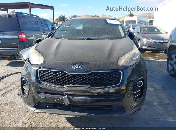 KNDPN3AC1J7354564 2018 KIA SPORTAGE Black Rear interior view