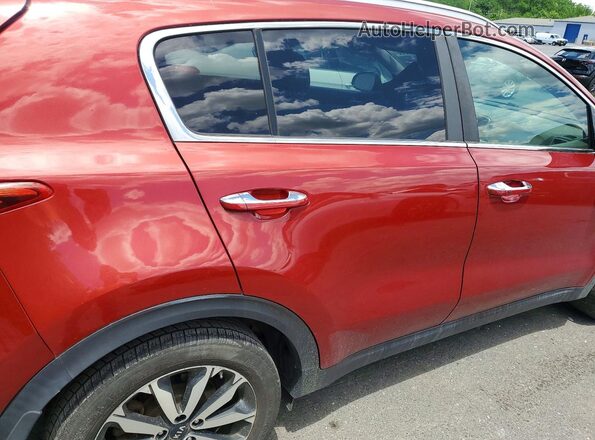 KNDPN3AC5H7212972 2017 KIA SPORTAGE Red Սալոնի հետևի տեսք
