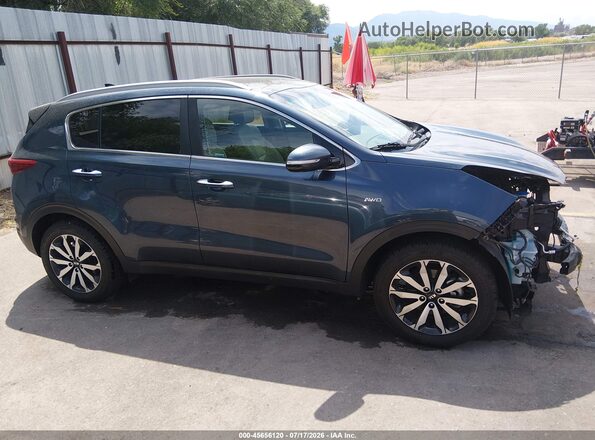 KNDPNCAC4H7184033 2017 KIA SPORTAGE Blue Rear interior view