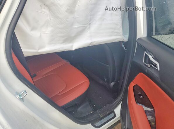 KNDPVCAF0P7144721 2023 KIA SPORTAGE White Vista interior trasera