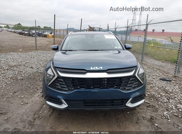 KNDPVCAG2P7117187 2023 KIA SPORTAGE HYBRID Dark Blue Widok wnętrza z tyłu