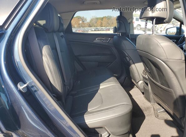 KNDPVCAG3P7014151 2023 KIA SPORTAGE Blue Vista interior trasera