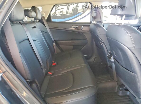 KNDPVCAG4P7087657 2023 KIA SPORTAGE Gray Vista de los asientos traseros
