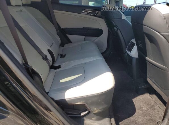 KNDPVCAG9P7103383 2023 KIA SPORTAGE Черный Вид задней части салона