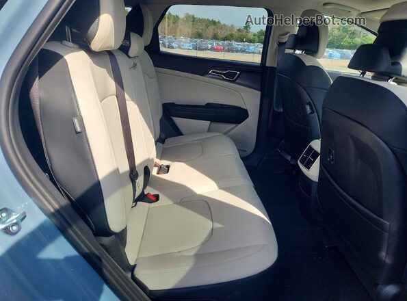 KNDPVDDG0T7298480 2026 KIA SPORTAGE Blue Rear interior view