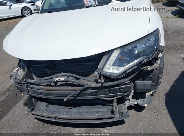 KNMAT2MTXHP564592 2017 NISSAN ROGUE White Rear interior view