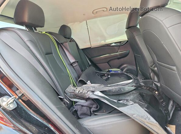 LRBFZME47RD073244 2024 BUICK ENVISION Black უკანა სალონის ხედი