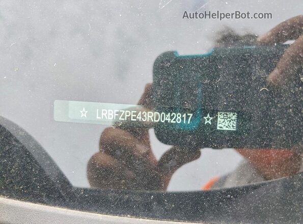 LRBFZPE43RD042817 2024 BUICK ENVISION White Вид наклейки з VIN-кодом